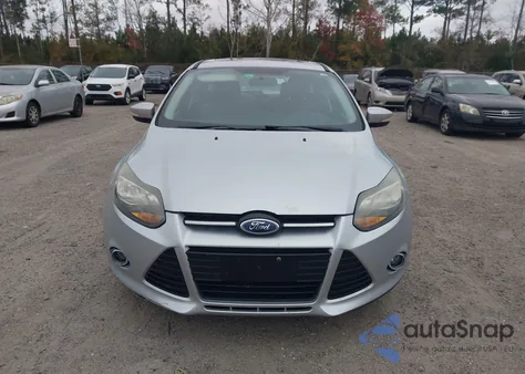 2014 Ford Focus Titanium из США, поврежденный, VIN 1FADP3N24EL269770